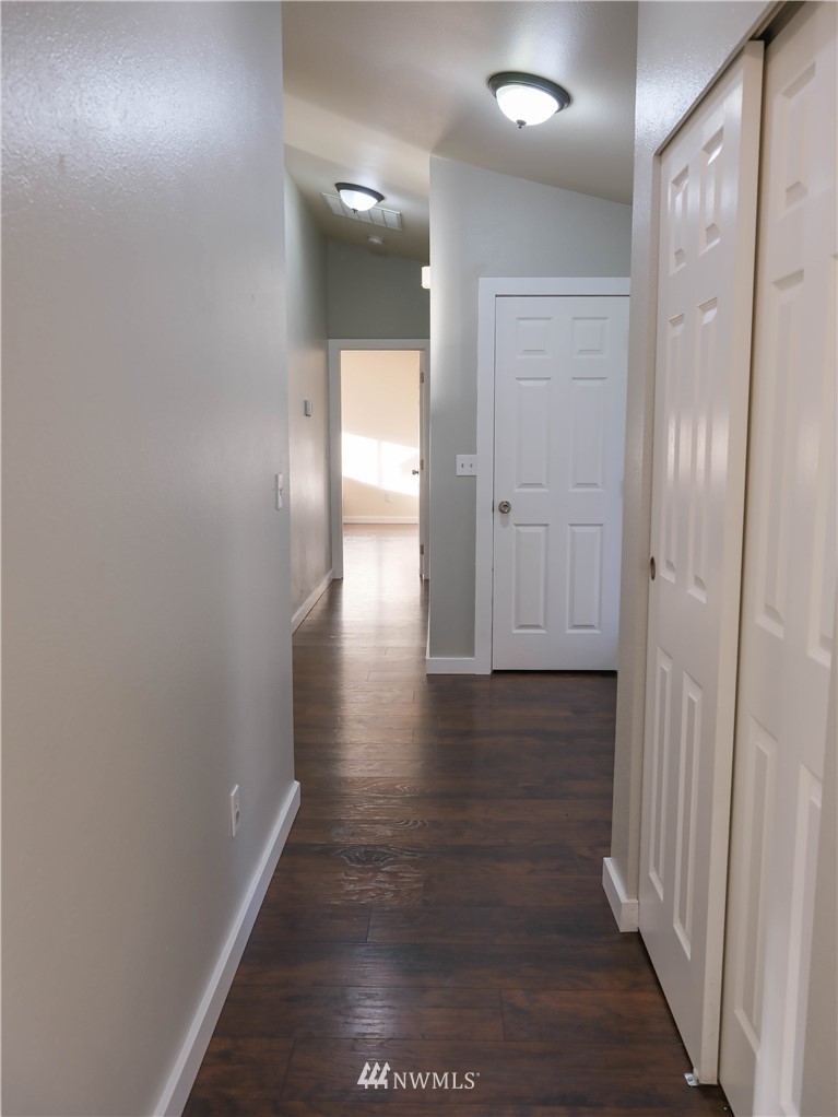 18041 Daryl Lane Southwest Rochester, WA 98579 - Photo 21 of 29 a view of hallway with wooden floor