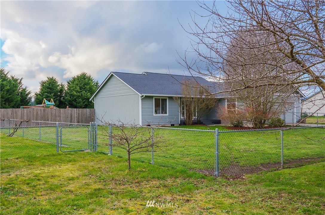 18041 Daryl Lane Southwest Rochester, WA 98579 - Photo 3 of 29 a view of a house with backyard and a tree