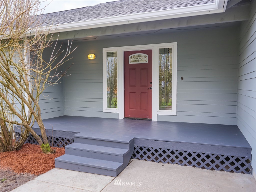 18041 Daryl Lane Southwest Rochester, WA 98579 - Photo 4 of 29 a front view of a house with entryway