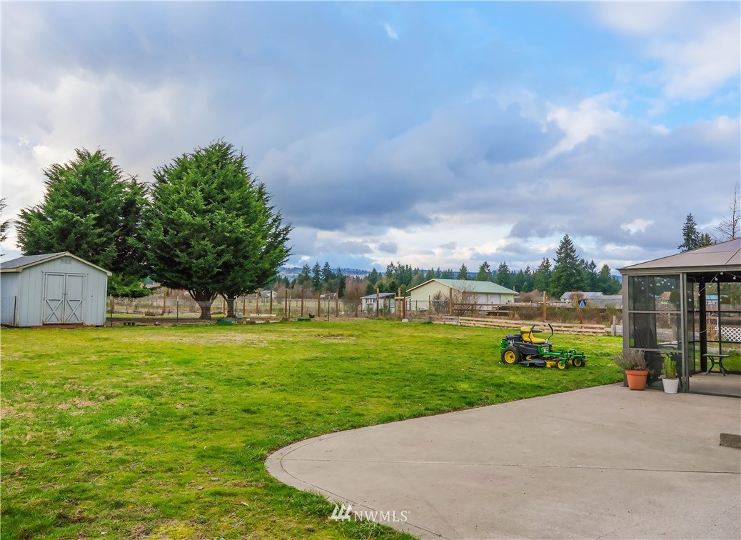 18041 Daryl Lane Southwest Rochester, WA 98579 - Photo 5 of 29 a view of a backyard with green space