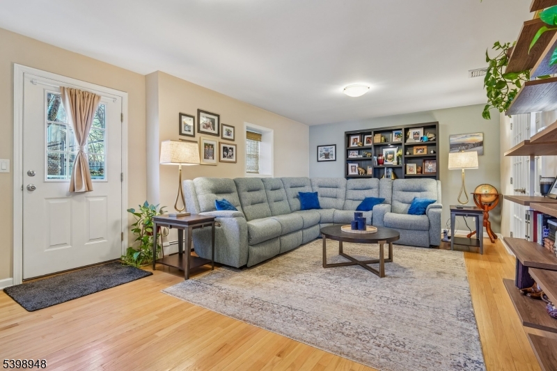 305 Kingsland Road Landing, NJ 07850 - Photo 16 of 40 a living room with furniture and a book shelf