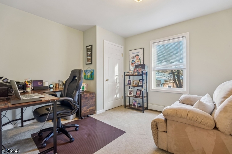 305 Kingsland Road Landing, NJ 07850 - Photo 28 of 40 a view of a livingroom with workspace and a window