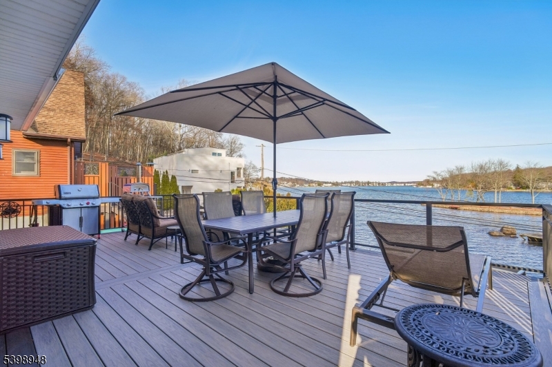 305 Kingsland Road Landing, NJ 07850 - Photo 30 of 40 a view of a roof deck with table and chairs