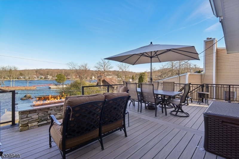305 Kingsland Road Landing, NJ 07850 - Photo 31 of 40 an outdoor space with furniture and umbrella