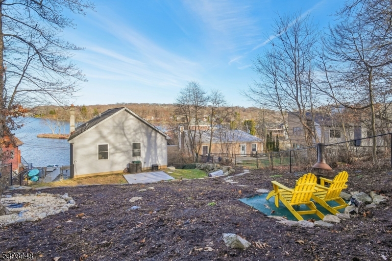 305 Kingsland Road Landing, NJ 07850 - Photo 33 of 40 a view of a house with a yard and sitting area