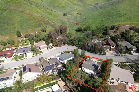 an aerial view of a city with lots of residential buildings