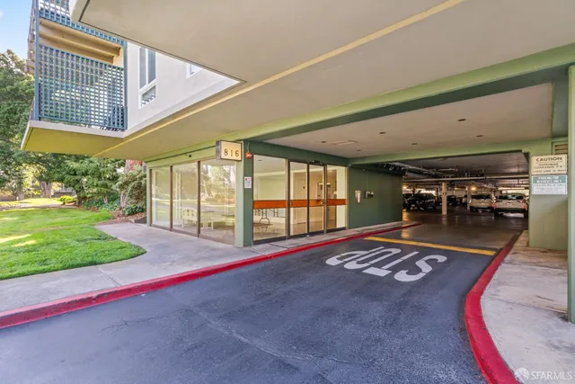 a view of a backyard with sitting area