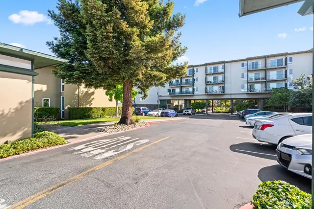 a car parked in front of a house