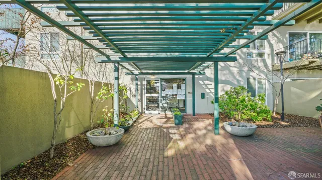 a view of a street with a building in the background