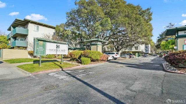 a view of a street with cars