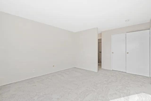 a view of a livingroom with a staircase