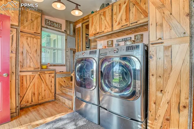 a utility room with dryer and washer
