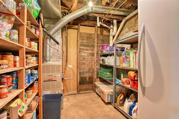 a view of a car park in front of house