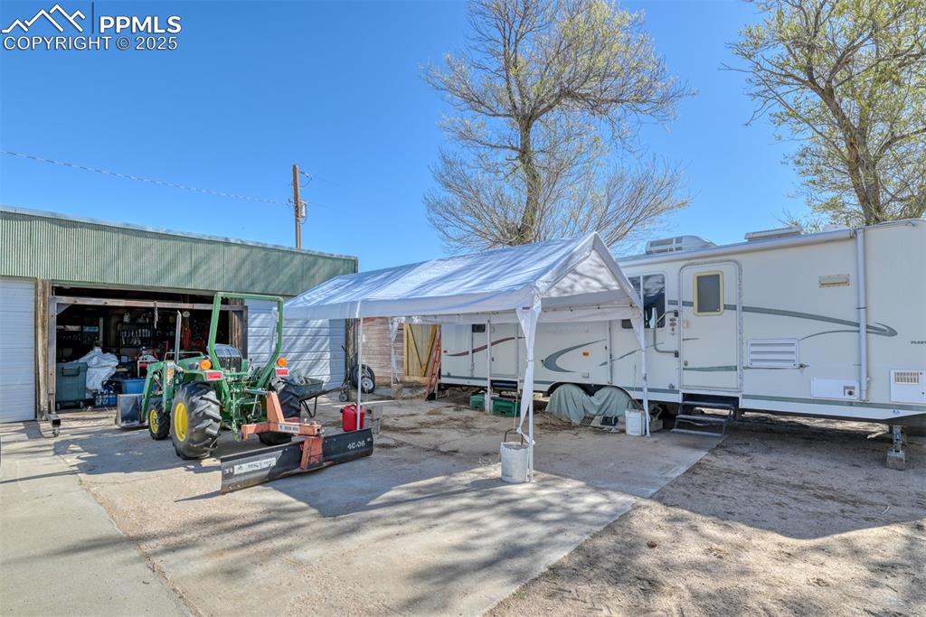 22500 Enoch Road Calhan, CO 80808 - Photo 25 of 50 a view of a room with gym equipment