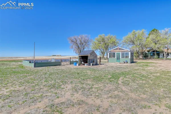 a view of a yard with a deck