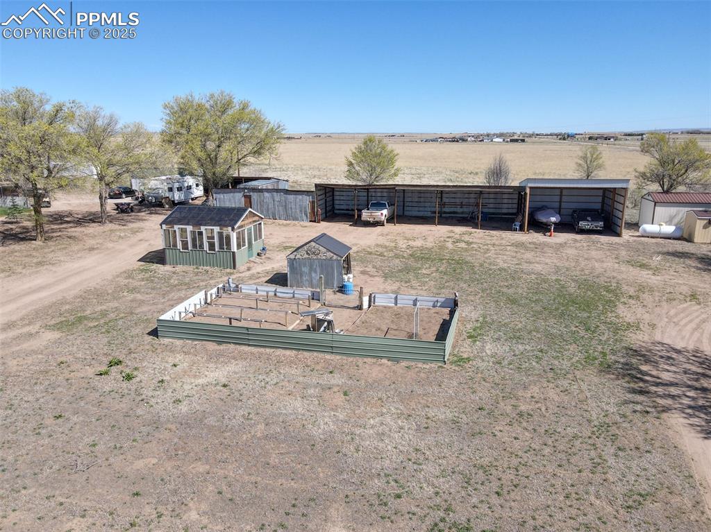 22500 Enoch Road Calhan, CO 80808 - Photo 49 of 50 a view of a terrace with a garden