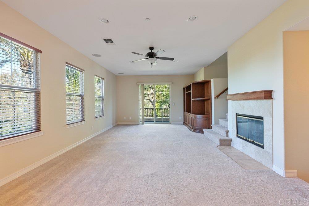 2204 Huntington Point Road, Unit 13 Chula Vista, CA 91914 - Photo 28 of 28 a big room with windows and fireplace