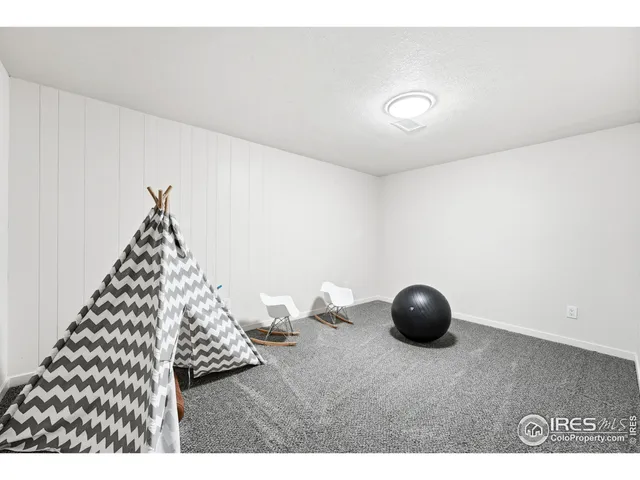 a view of a livingroom with wooden floor