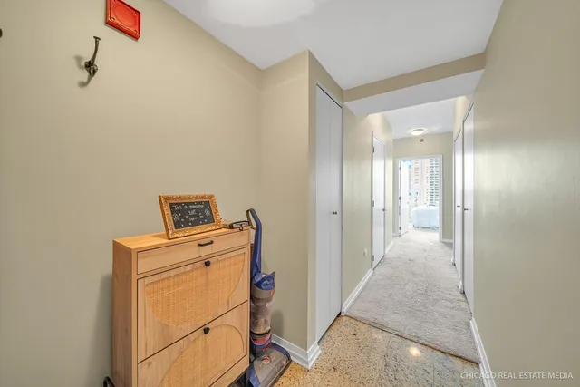 a view of a hallway with workspace