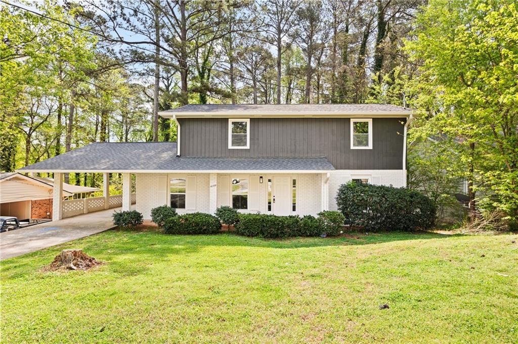 a view of a house with garden