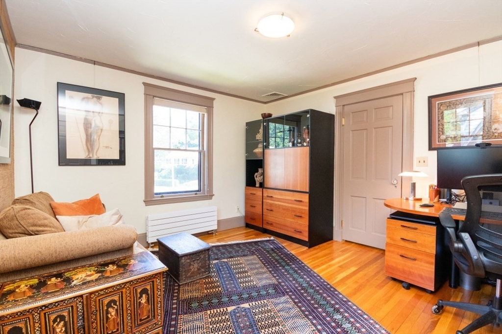 4 Charlotte Road Newton, MA 02459 - Photo 19 of 32 a bedroom with furniture and a window