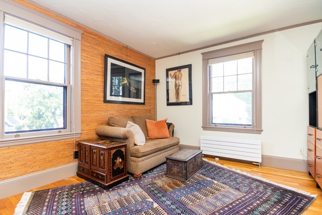 4 Charlotte Road Newton, MA 02459 - Photo 20 of 32 a living room with furniture and a window
