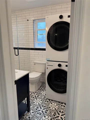 a bathroom with a toilet and a sink