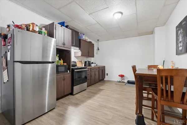 a kitchen with stainless steel appliances granite countertop a stove and cabinets