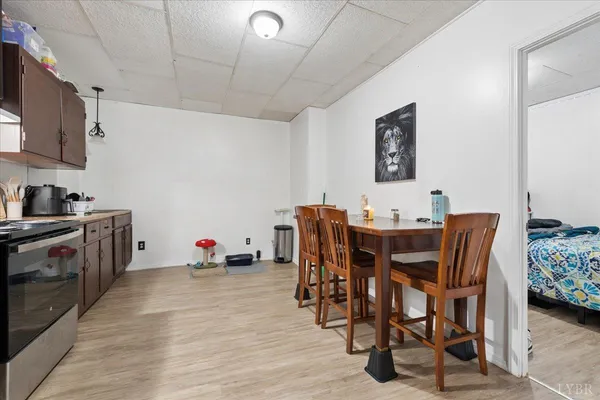 a kitchen with stainless steel appliances granite countertop a stove and a refrigerator