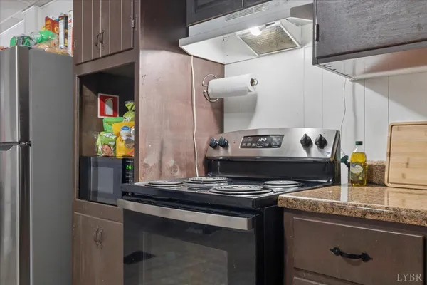 a view of a balcony with wooden floor