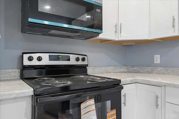 a bathroom with a bathtub and shower curtain
