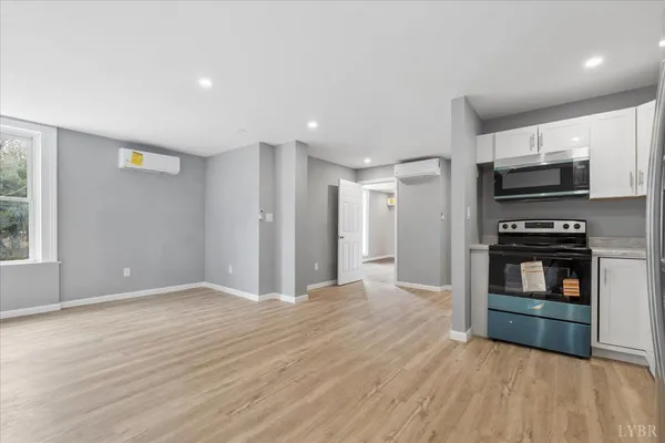 a view of a house with a yard porch and sitting area