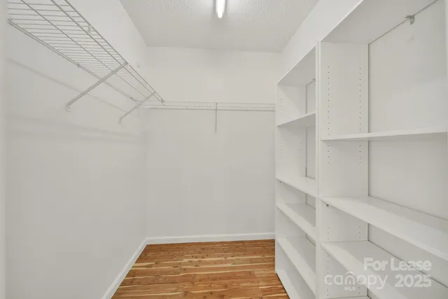 a view of a room with white walls