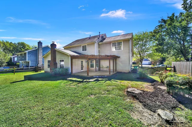 a view of a house with a big yard