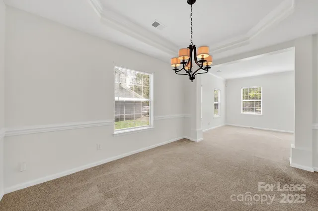 a view of a chandelier in a room