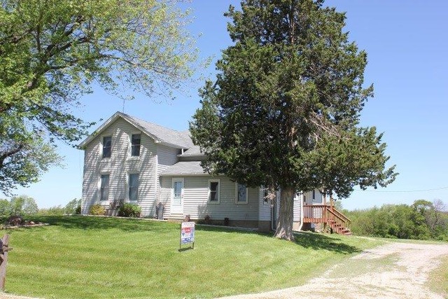 11830 Nelson Road Morrison, IL 61270 - Photo 1 of 15 a front view of a house with a yard