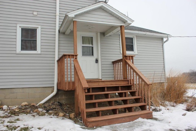 11830 Nelson Road Morrison, IL 61270 - Photo 14 of 15 a view of a house with wooden floor and a wooden fence