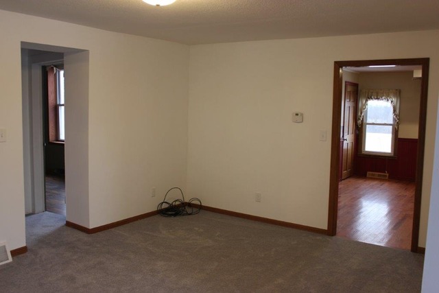 11830 Nelson Road Morrison, IL 61270 - Photo 5 of 15 a view of a room with wooden floor and a bathroom