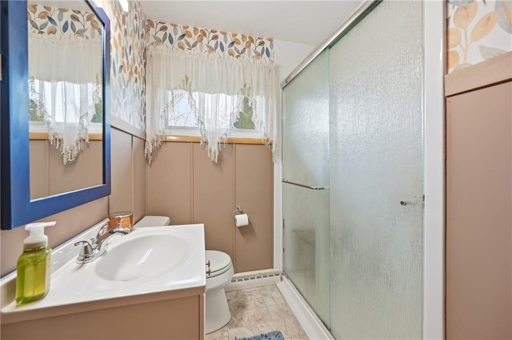 256 Donald Road Hermitage, PA 16148 - Photo 22 of 28 a bathroom with a sink and a mirror