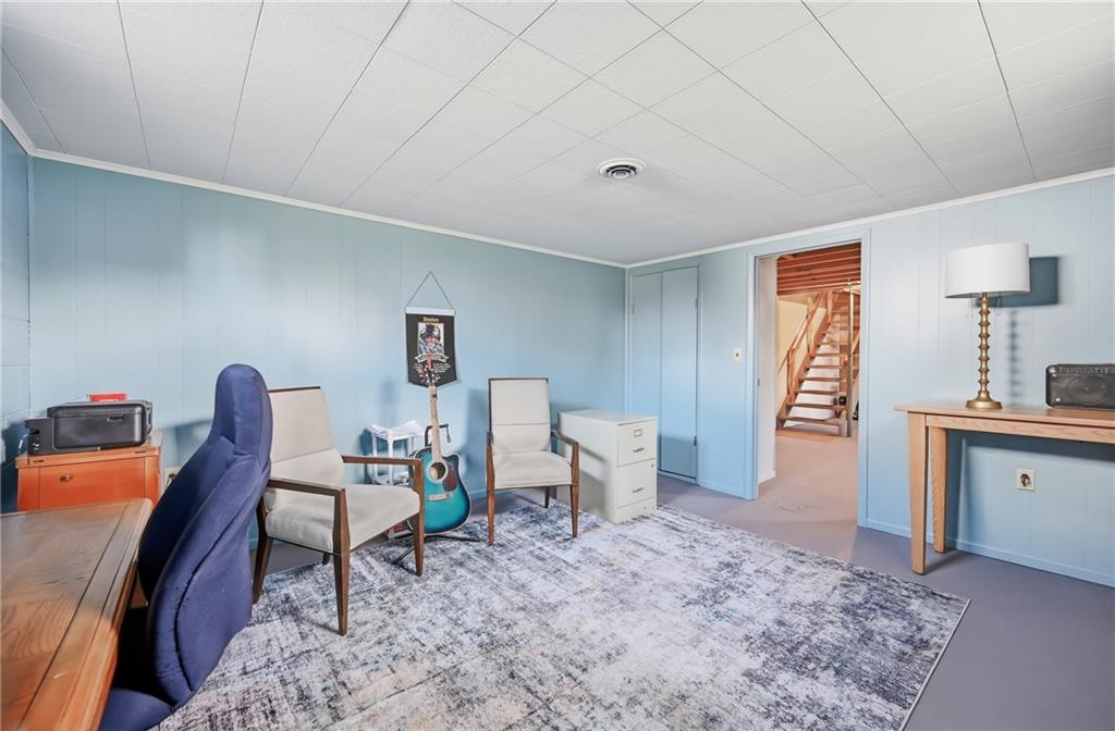 256 Donald Road Hermitage, PA 16148 - Photo 24 of 28 a living room with furniture a rug and a window