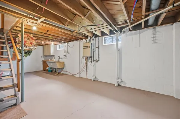 a view of a room with wooden walls