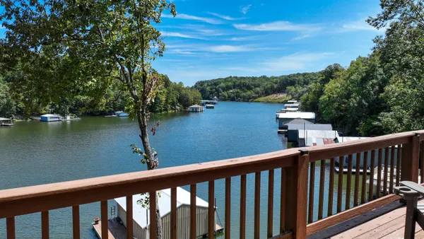 a view of a lake from a balcony