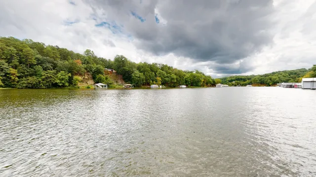 a view of lake with green space
