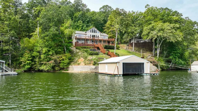 a house view with a lake view