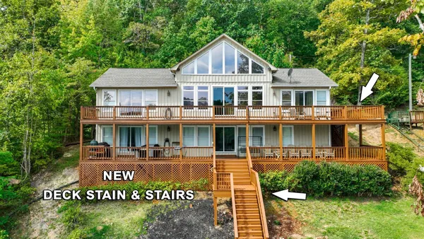 a front view of residential houses with yard