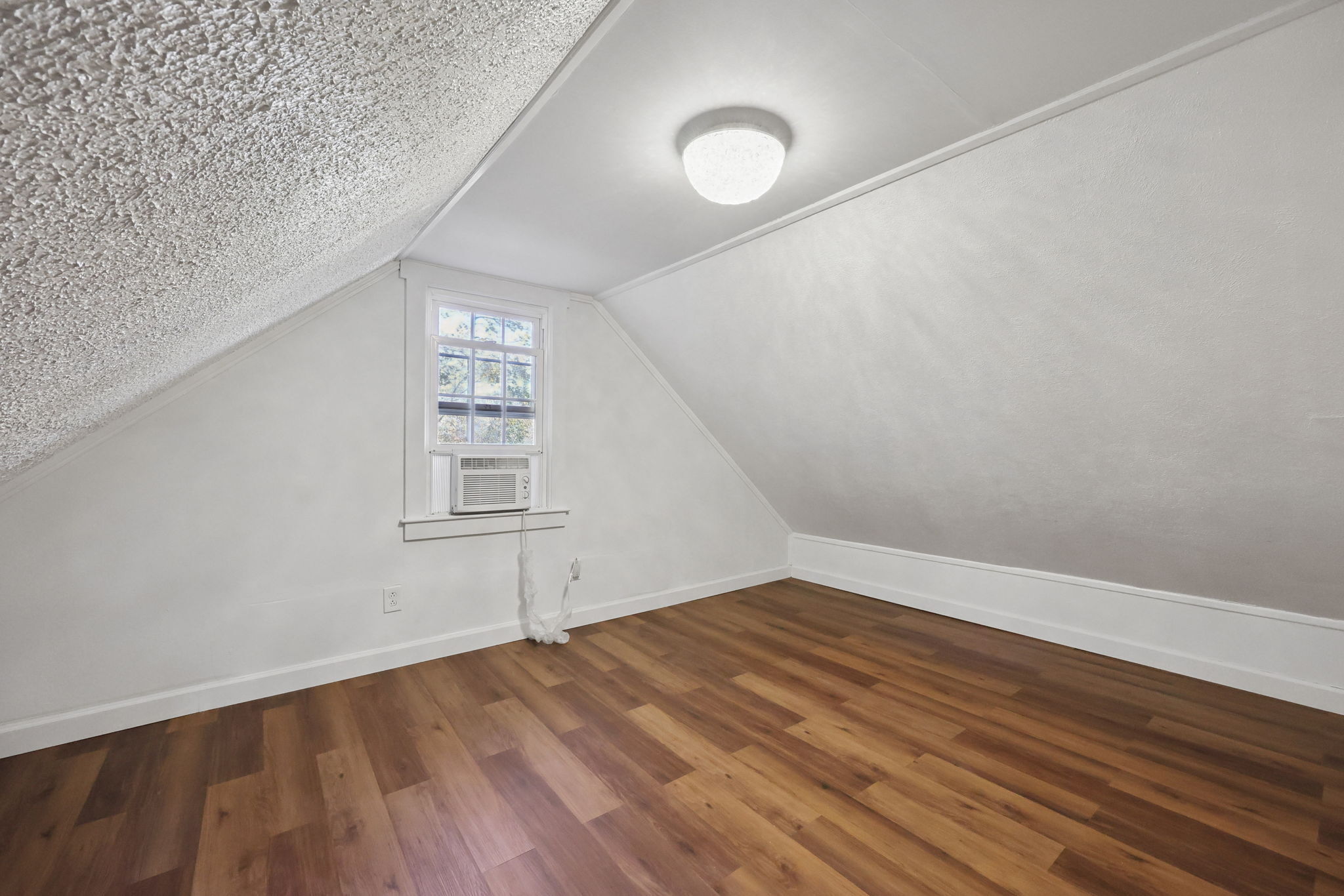 18 Lake Boulevard East Hampton, CT 06424 - Photo 15 of 31 a view of empty room with wooden floor and fan