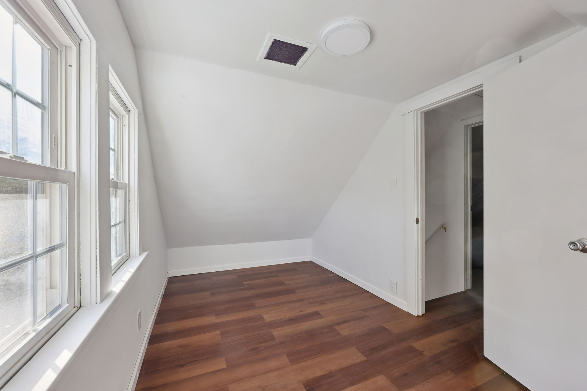 18 Lake Boulevard East Hampton, CT 06424 - Photo 18 of 31 wooden floor in an empty room with a window