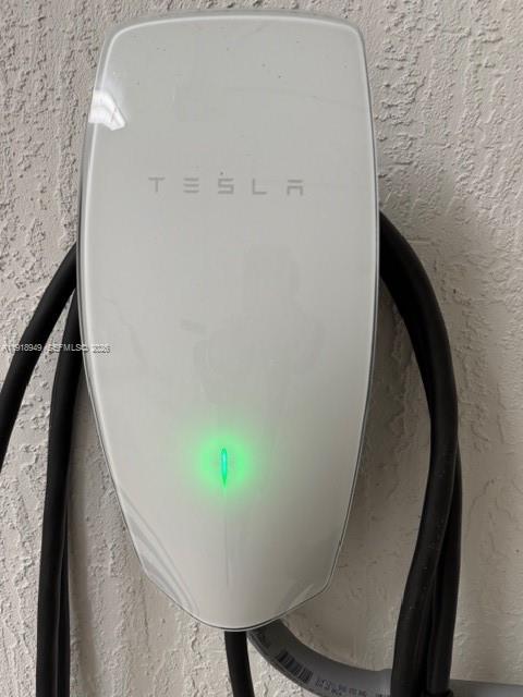 6280 Southwest 47th Court, Unit 8 Davie, FL 33314 - Photo 2 of 24 Tesla charger in Garage