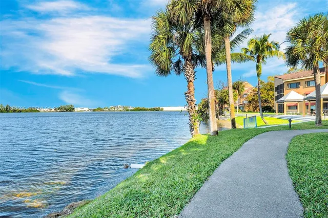 a view of a pathway both side of house