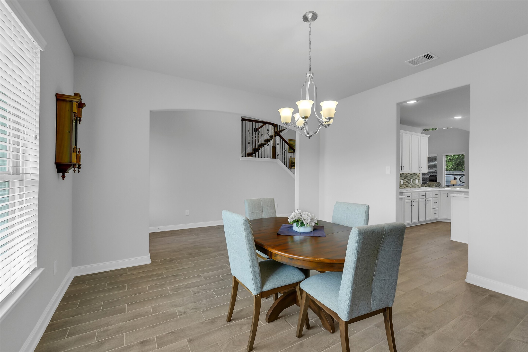 2803 Skerne Forest Dr Spring Spring, TX 77373 - Photo 16 of 44 a dining room with furniture and chandelier